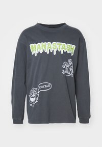 Gray long-sleeve t-shirt featuring green dripping text "MANASTASH," with white cartoon accents: a mushroom and a character saying "BOOYEAH!"