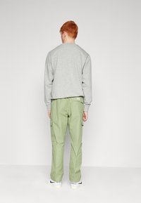 Nike Sportswear Cargobyxor - green