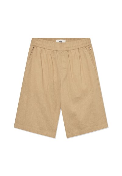 Beige Baumwollshorts mit einem elastischen Bund, zwei Seitentaschen und einer lockeren Passform. Der Stoff hat eine subtile Textur.