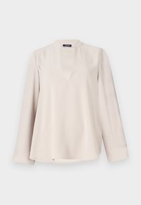 Blusa lunga color beige chiaro con scollatura a chiave e orlo arrotondato. Realizzata in tessuto morbido, presenta una vestibilità comoda e dettagli minimi.