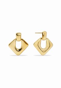 Zlatne metalne naušnice s geometrijskim dizajnom koji sadrži dijamant oblik i manju petlju na vrhu. Glatka, reflektirajuća površina.