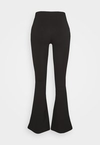 Schwarze ausgestellte Leggings aus dehnbarem Material, mit einem hohen Taillenbund, glatter Textur und einer figurbetonten Passform mit weitem Saum.