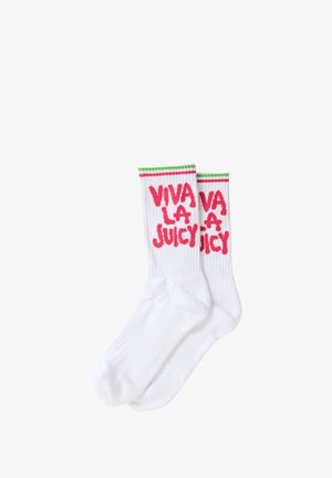 Chaussettes en coton blanc avec une texture côtelée, présentant l'inscription rose "VIVA LA JUICY" et des rayures vertes en haut. Design longueur cheville.