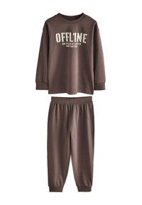 Bruin katoenen loungewear set bestaande uit een top met lange mouwen met de tekst "OFFLINE" en bijpassende broek met elastische tailleband. Zachte textuur, comfortabele pasvorm.