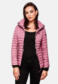 Padded puffer jacket in light pink with a high collar, zippered front, and black accents. Features ribbed cuffs and a fitted design.