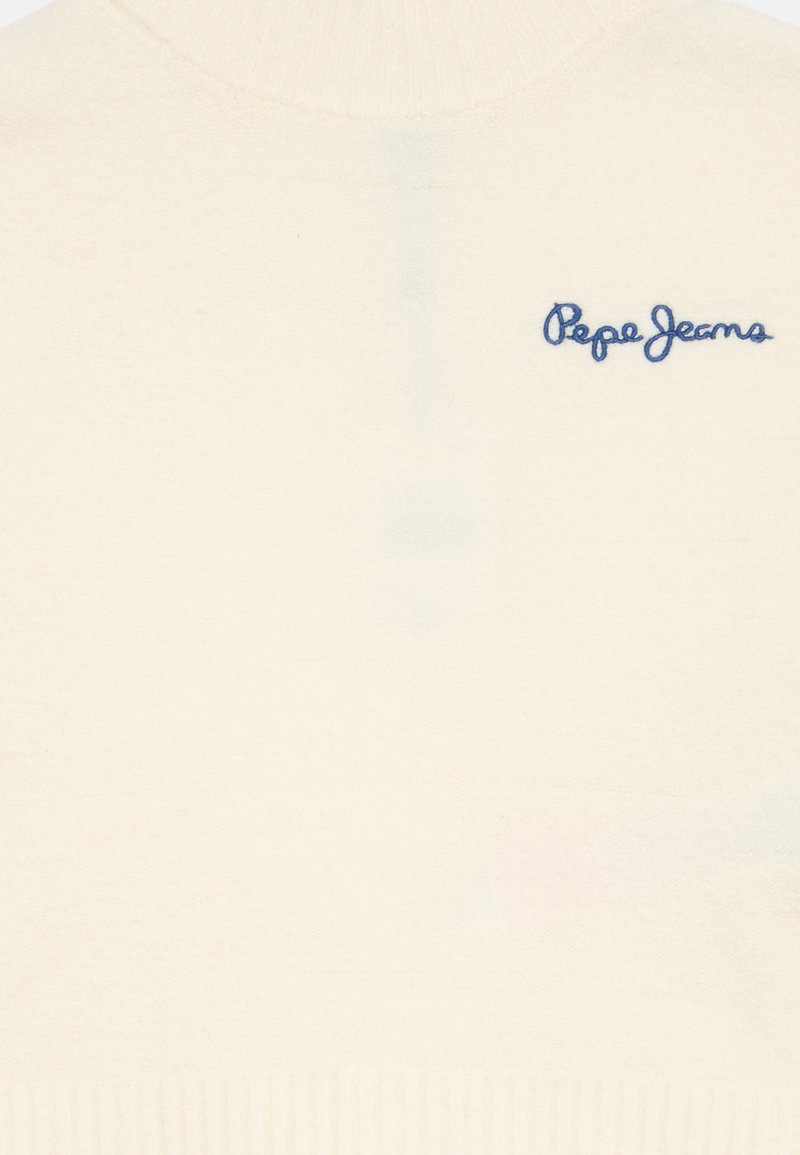 Jersey color crema con cuello y dobladillo acanalados. Presenta "Pepe Jeans" bordado en azul en la parte delantera. Textura suave, diseño minimalista.