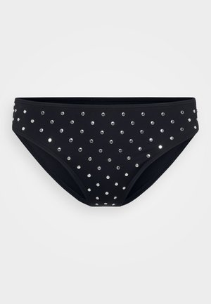Zwarte bikini onderkant met zilveren studs in een stippenpatroon. Gemaakt van glad, stretchy katoen met een klassieke snit.