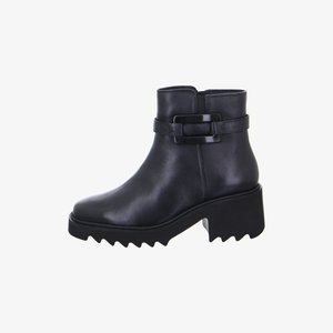 Schwarzer Leder-Stiefelette mit klobiger gezackter Sohle, Blockabsatz und dekorativem Schnallenriemen am oberen Rand.