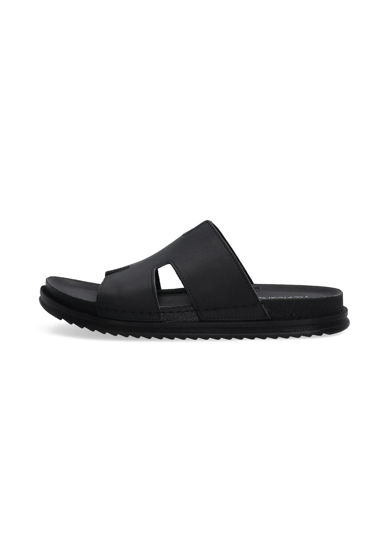Sorte læder slidesandal med flad gummisål, der har et udskæringsdesign på overdelen og teksturerede accenter langs kanterne.