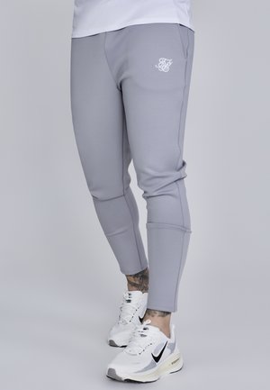 ESSENTIALS JOGGERS - Tepláky - grey