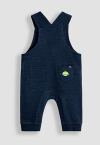 Romper per neonato blu navy con spalline incrociate, due tasche posteriori, una delle quali con ricamo di un pianeta giallo e un anello azzurro.