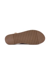 Rubber sandal sole in brown, featuring horizontal grooves for traction. The sole has a rounded shape, smooth texture, and a slight curve at the toe.