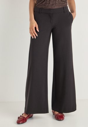 LOW FLARED SUIT TROUSERS - Stoffhose - black