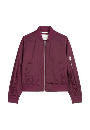 Veste bomber bordeaux avec fermeture à glissière sur le devant, col, poignets et ourlet côtelés, deux poches avant et poche zippée sur la manche gauche.