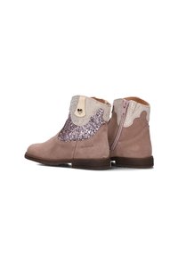 Suede ankle boots in light pink with a glittery rose gold side panel, scalloped cream collar, and a side zipper. Flat brown sole.