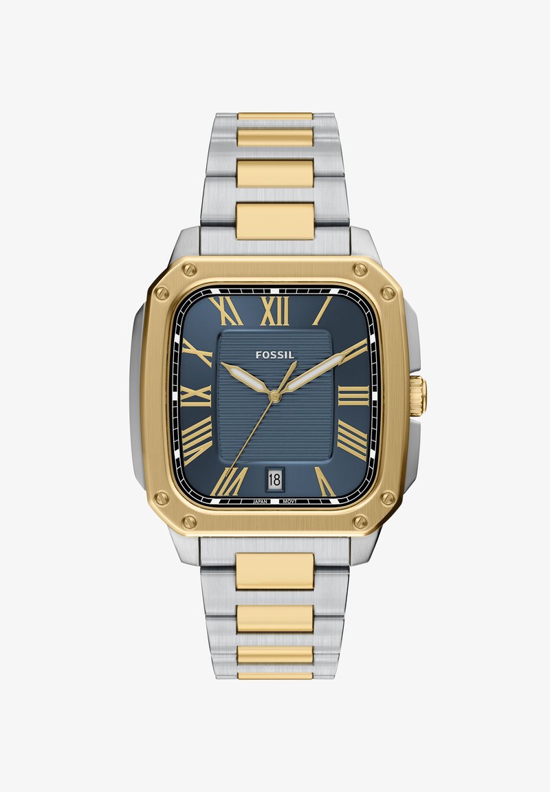 Reloj Fossil cuadrado con esfera azul texturizada, indicadores de hora dorados y visualización de fecha. La pulsera de metal presenta acentos en plata y oro.