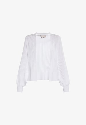 Baltas kardiganas su briaunota tekstūra, atviru priekiu ir pūkuotomis rankovėmis. Pagamintas iš lengvos medžiagos, su laisvu siluetu ir lygiu paviršiumi.