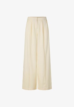 Pantalones anchos de talle alto en color crema, con pliegues frontales y bolsillos laterales, que cuentan con una cremallera oculta en el frente y cierre en la cinturilla.