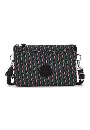 Petit sac bandoulière rectangulaire avec motif géométrique noir, vert et rose, sangle noire ajustable et un porte-clés singe.