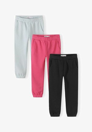 Trois pantalons de jogging à taille élastique en gris clair, rose vif et noir, disposés côte à côte sur fond blanc.