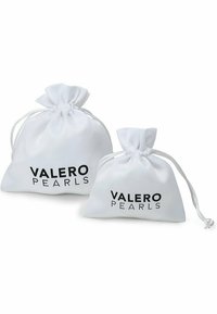 Two white fabric pouches with a drawstring closure. Each features the printed text "VALERO PEARLS" in bold black lettering.