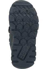 Suela de zapato de goma negra con un diseño texturizado que presenta patrones angulares y surcos profundos para una mejor agarre. Talla marcada como 25.