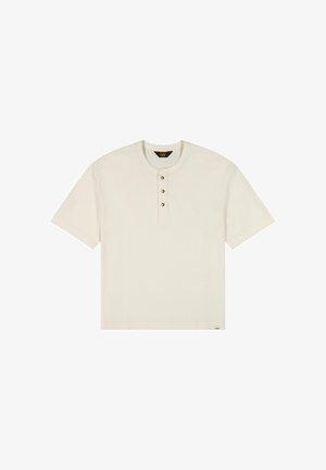 Korte mouwen, crème T-shirt met een ronde halslijn en een drieknopensluiting. Glad oppervlak met logodetail bij de zoom.