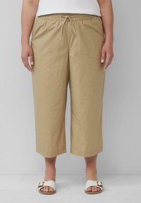 Beige Cropped-Hosen mit elastischem Bund und verstellbarem Kordelzug. Glatter Stoff, gerader Schnitt, mit gesäumtem Abschluss.