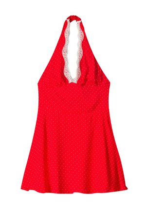 Red halter dress with white polka dots, lace trim on neckline, flared silhouette, soft fabric, and elasticated detail at the back.