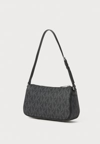 Black and gray Michael Kors shoulder bag with adjustable strap and repeated "MK" logo pattern, shown on white background.