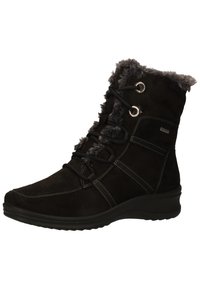 Bottine noire en suede avec doublure en fausse fourrure, devant à lacets et œillets en métal. Elle possède une semelle rembourrée et des détails de couture contrastés.
