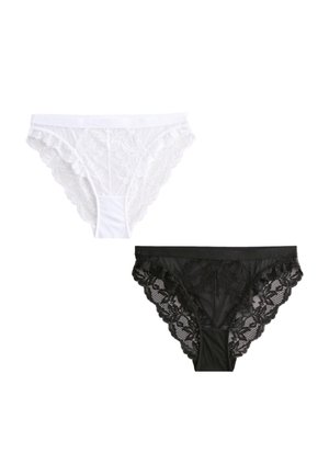 Dwie koronki w stylu bikini, jedna biała i jedna czarna, wyłożone płasko, pokazujące kwiatowe wzory koronki i faliste krawędzie.
