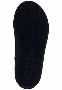 Suela de goma negra con un patrón de espiga, que presenta un logotipo y una superficie texturizada para mayor agarre y durabilidad.