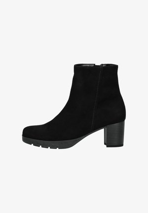 Black suede ankle boot with a rounded toe, a side zipper, and a block heel. Features textured sole for grip and raised stitching accents.