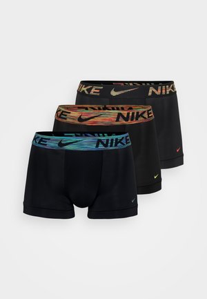 Kolm paari musti Nike bokserpükse, millel on värvilised elastsed püksivööd, millel on gradientmustrid. Iga paari küljel on väike logo.