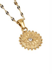 Collar con colgante de oro que presenta un diseño redondo en relieve con un motivo de ojo y un rhinestone central, colgado de una delicada cadena.