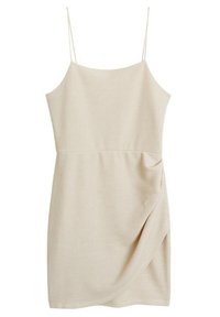 Robe mini sans manches en ribbed beige avec de fines bretelles spaghetti et un subtil détail plissé sur le côté droit.