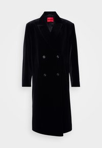 Μαύρο βελούδινο παλτό διπλής σειράς με κεντητές εσάρπες, μακριά μανίκια, δύο μπροστινές τσέπες και φωτεινή κόκκινη εσωτερική ετικέτα.