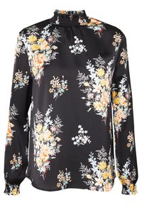 Blouse florale noire à manches longues, dot ée d'un col froncé. Motifs floraux en nuances de jaune, rose et bleu sur un tissu lisse.