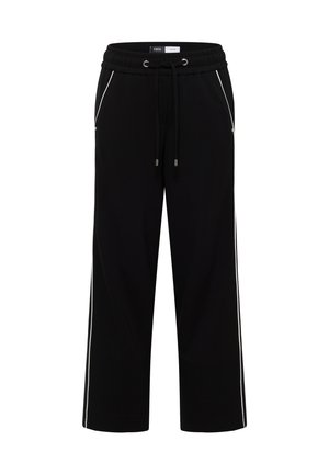 Mustat verkkarit, joissa on rento istuvuus, kiristettävä vyötärö, sivutaskut ja valkoiset sivuvenytykset korostetusti. Pehmeä kangas.