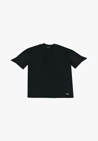 Camiseta de algodón negra con cuello redondo, mangas cortas, corte recto y una pequeña etiqueta con el logo en el dobladillo inferior delantero.