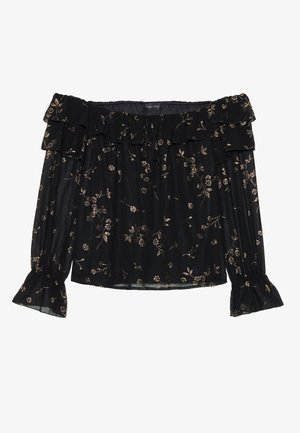 Blouse noire décolletée avec un col et des poignets à volants. Présente des motifs floraux dorés sur l'ensemble d'un tissu léger.