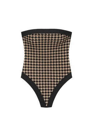Højtaljet bandeau badedragt i houndstooth mønster, med beige og sorte farver, samt en ensfarvet sort kant øverst og ved benåbningerne.