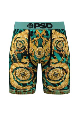 Shorts met een turquoise tailleband, complexe gouden barokpatronen en een ontwerp met zwart accent, kettingen en medaillons.