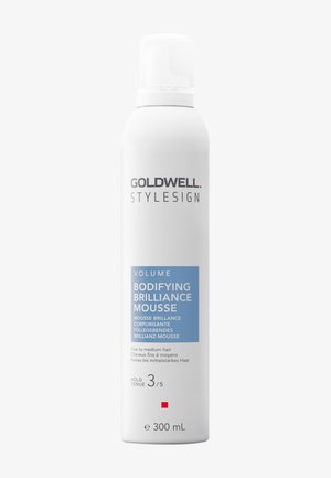 Goldwell Stylesign Volume Bodifying Brilliance Mousse pour cheveux fins à moyens, 300 ml avec un niveau de fixation 3 sur 5 en flacon blanc.