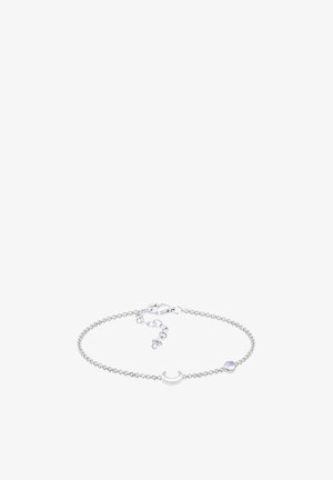 Silberne Kettenarmband mit einer gebogenen Mondsichel und einem Mondsteinakzent, mit einem Karabinerhakenverschluss und verstellbarer Länge.