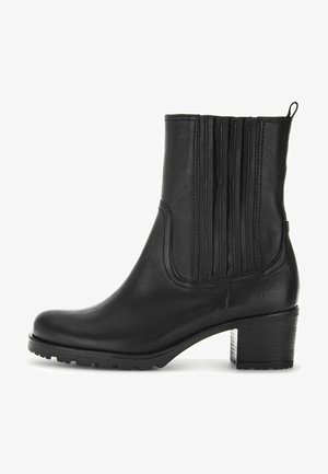 Zwarte leren enkellaars met een gladde afwerking, elastische zijpanelen en een blokhak. Beschikt over een ronde neus en een gestructureerde buitenzool.