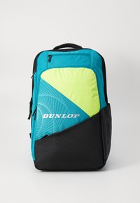 Dunlop backpack in teal and lime green, features geometric design, black bottom, multiple zippered compartments, and sturdy fabric texture.
