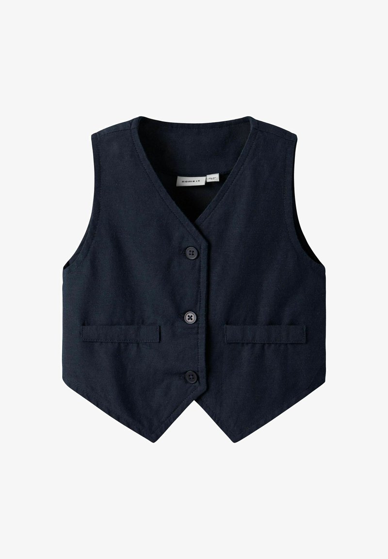 Gilet blu navy in tessuto strutturato, con scollatura a V, quattro bottoni e due tasche frontali, caratterizzato da un orlo affilato e appuntito.