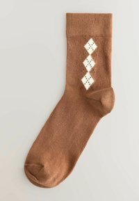 Brąsocka z prążkowaną fakturą, z białym wzorem w diamenty wzdłuż boku. Gładki materiał, zaokrąglony design palców.
